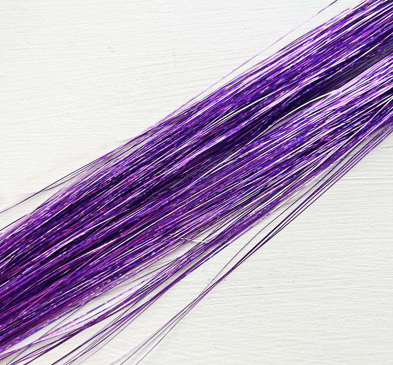 Hair tinsel in in purple.