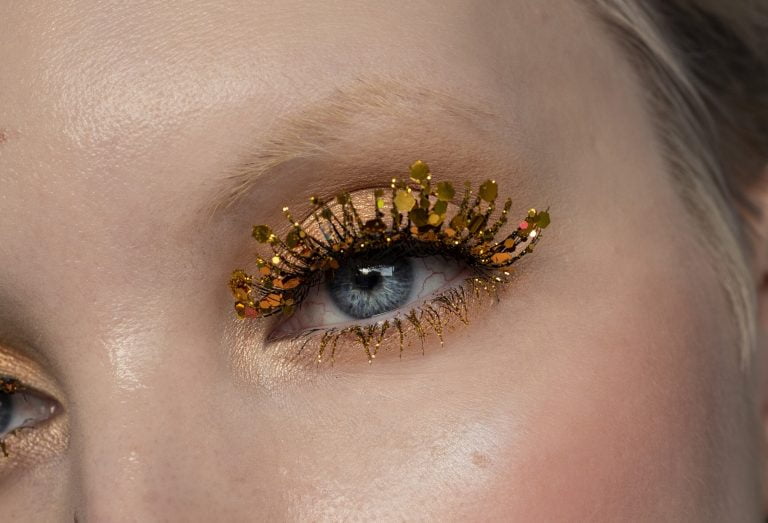 Cosmetic glitter added to false lashes
