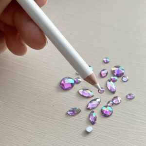 Vahakynä ihotimanttien nostoon.