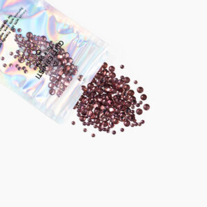 Mini Face Gems värissä dark pink.