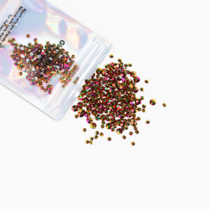 Mini Face Gems värissä holographic pink.